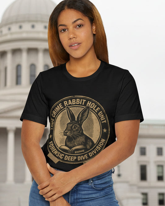 Person wearing a black t-shirt with a graphic design on a white background