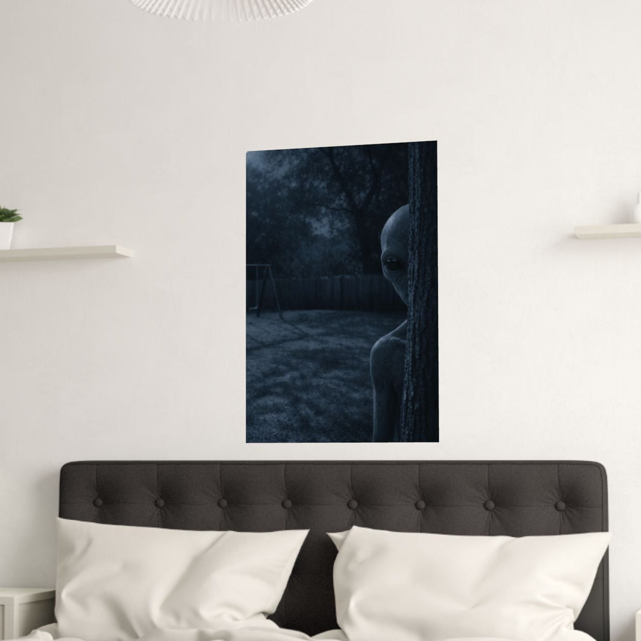 Alien poster in Modern bedroom with a bed, nightstands, and wall art.