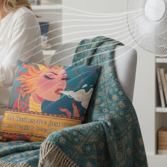 Woman sitting at a desk with a laptop, wearing glasses, in a home office setting.