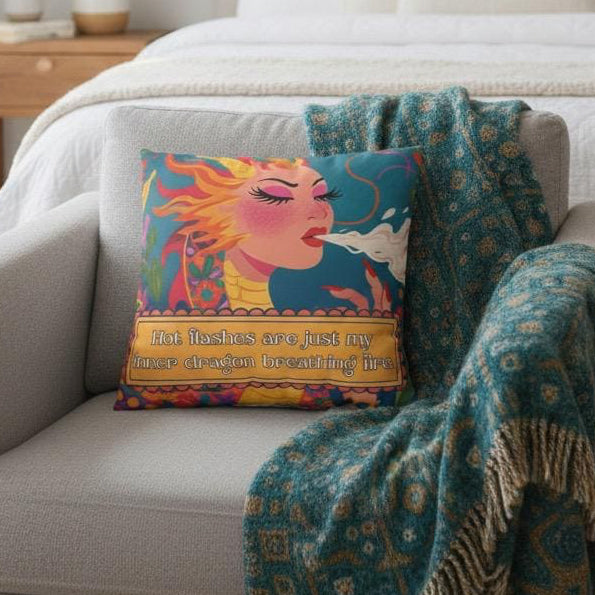 Cozy bedroom with a bed, armchair, and decorative pillows.